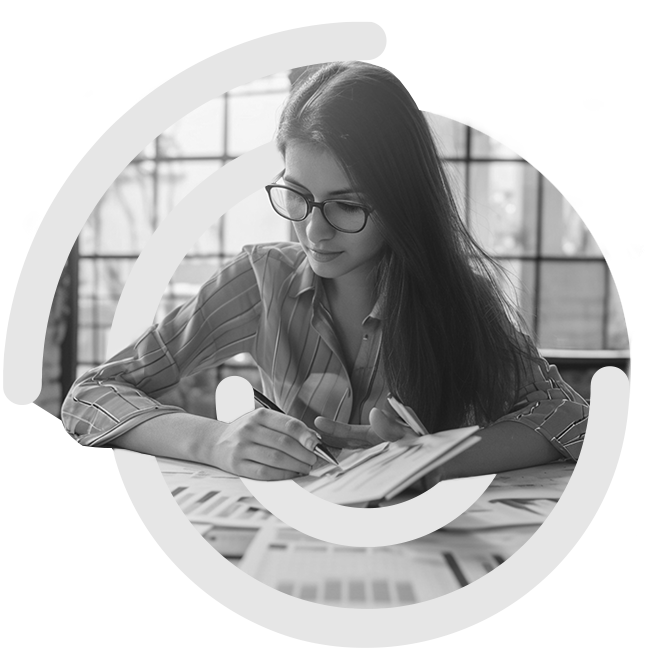 Lady at desk going through paperwork