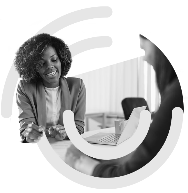 Two people discussing details