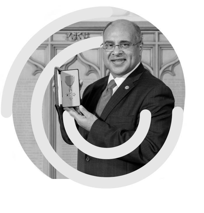 Amir Ali with OBE